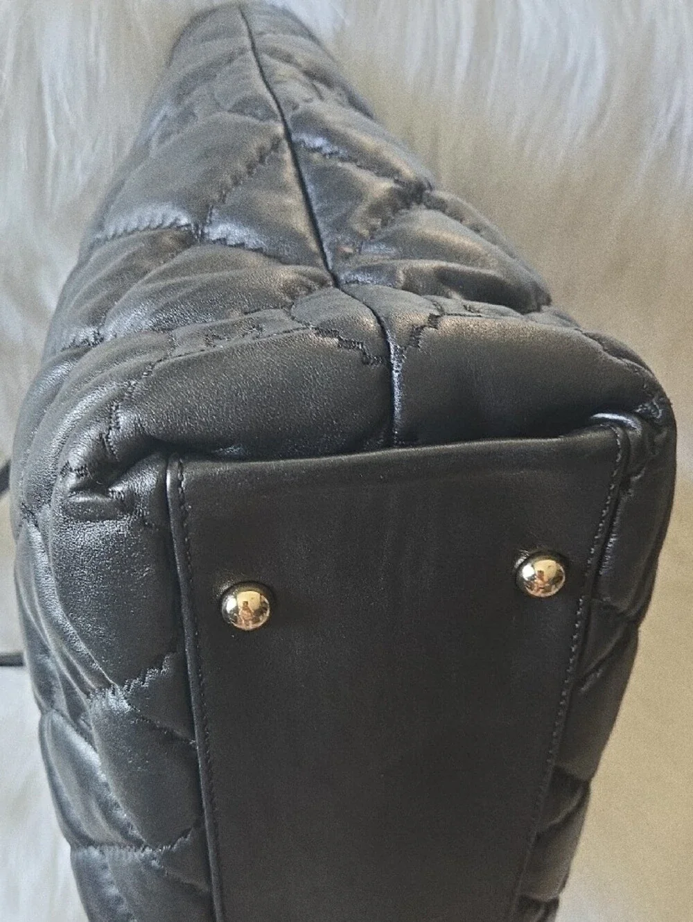 Quilted Black Tote with Gold Medallion Accent